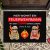 "A firefighter lives here with the flame of his life" with name - Personalized doormat